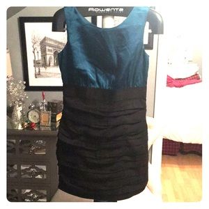 Black ruffle dress with teal satin top. Express